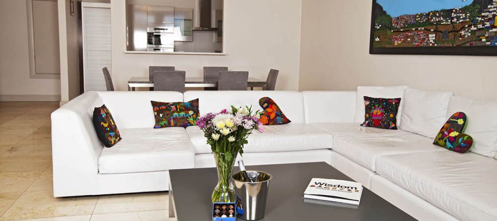 Waterfront Village Superior One Bdrm Living Room - Image 1