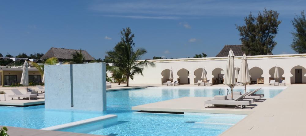 Lounge in the sun by the pool at Gold Zanzibar Beach House & Spa, Zanzibar, Tanzania (Mango staff photo) - Image 3