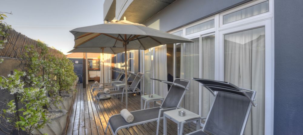 The veranda with sun loungers at O on Kloof, Cape Town, South Africa - Image 1