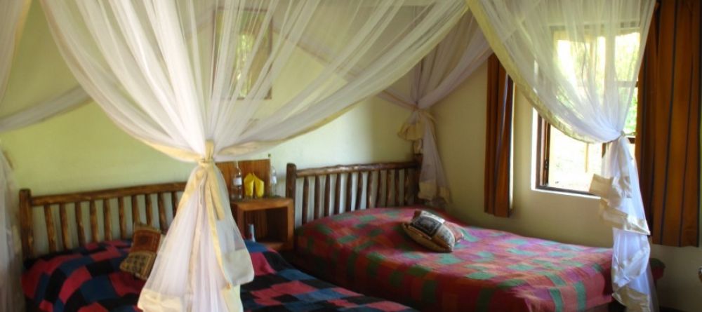 Bedroom at Volcanoes Bwindi Lodge, Bwindi Impenetrable Forest, Uganda - Image 1