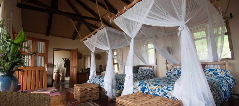 Bedroom at Virunga Lodge, Volcanoes National Park, Uganda - Image 17