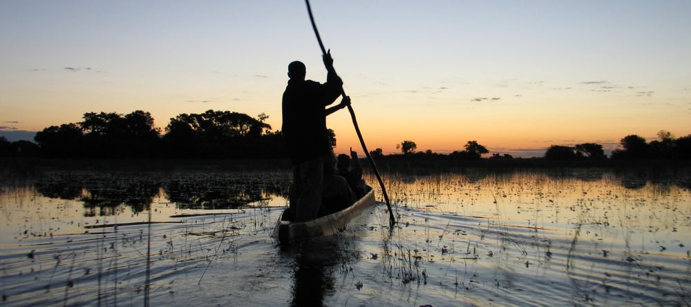 Boating at sunset at Guma Lagoon Camp, Okavango Delta, Botswana - Image 11