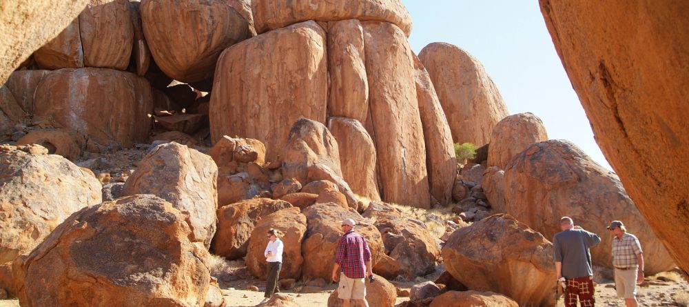 Hiking through the dramatic boulders at Wolwedans Dune Camp, NamibRand Nature Reserve, Namibia - Image 13