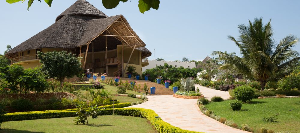 Manicured lawns and lush tropical gardens intermingle at Gold Zanzibar Beach House & Spa, Zanzibar, Tanzania  - Image 2