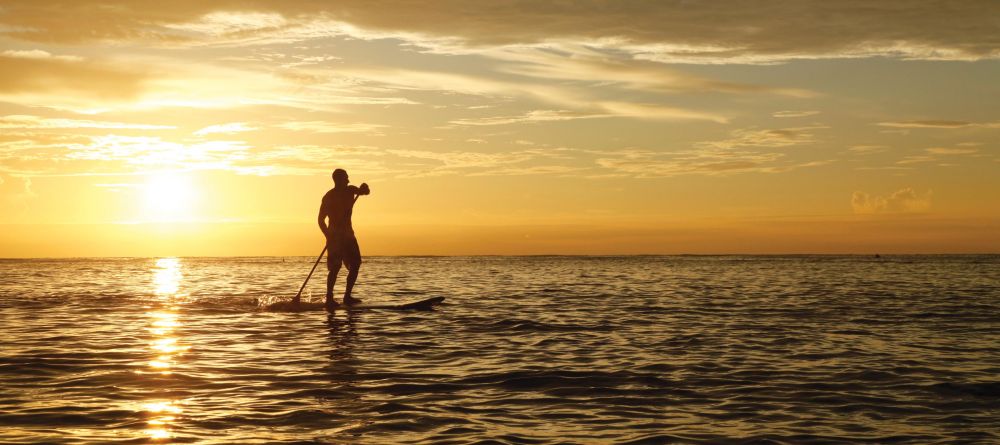 Paddle boarding at sunset at Desroches Island Resort, Desroches Island, Seychelles - Image 10