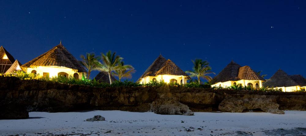 A view of the resort illuminated at night at Essque Zalu Zanzibar, Zanzibar, Tanzania - Image 8