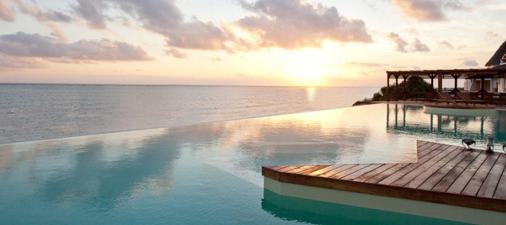 Marvel at the endless ocean and blue skies from your lounge chair at Essque Zalu Zanzibar, Zanzibar, Tanzania - Image 20