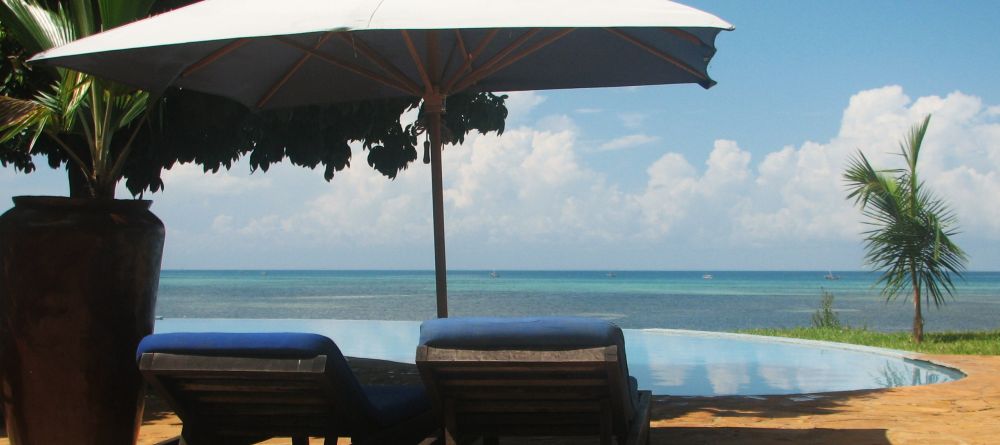 A shady place to relax by the pool at Fumba Beach Lodge, Zanzibar, Tanzania - Image 6