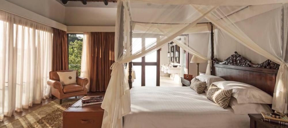 The luxuriously comfortable bedrooms at The Four Seasons Safari Lodge, Serengeti National Park, Tanzania - Image 7