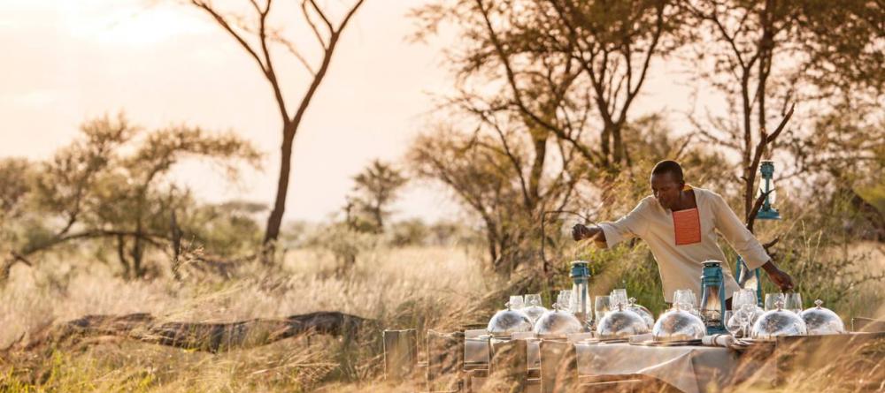 Dine in the African bush with elegant service and exquisite cuisine at The Four Seasons Safari Lodge, Serengeti National Park, Tanzania - Image 2