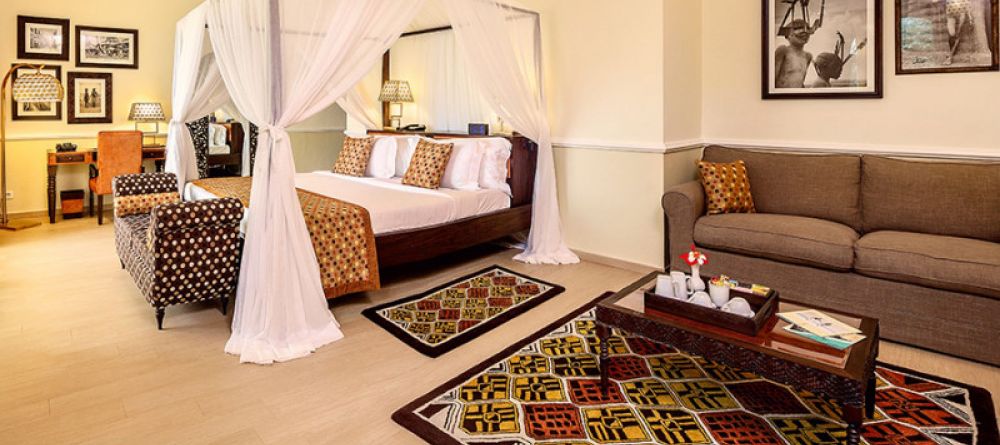Bedrooms have modern African-inspired decor at Hideaway of Nungwi Resort & Spa, Zanzibar, Tanzania - Image 1