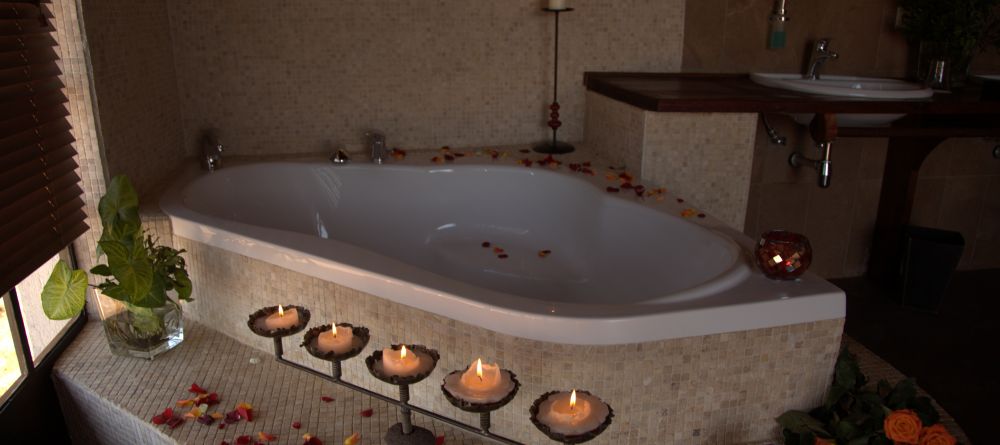 Unwind in a private soaking tub at Bashay Rift Lodge, Karatu, Tanzania - Image 2