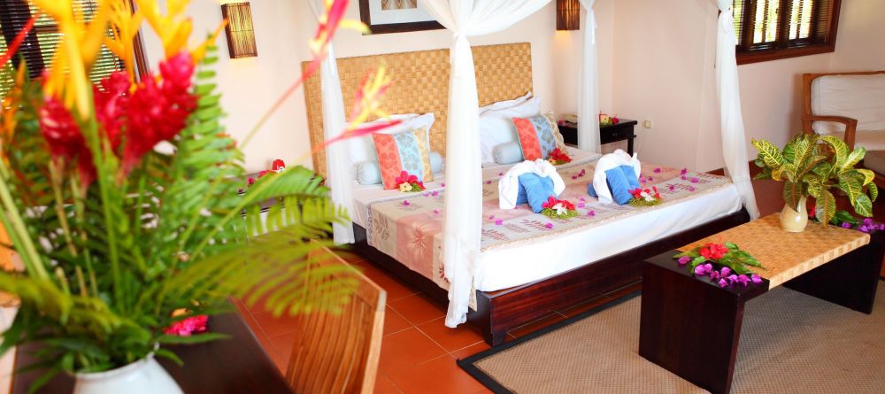 A colorful guest room at Hotel L Archipel, Praslin, Seychelles - Image 3