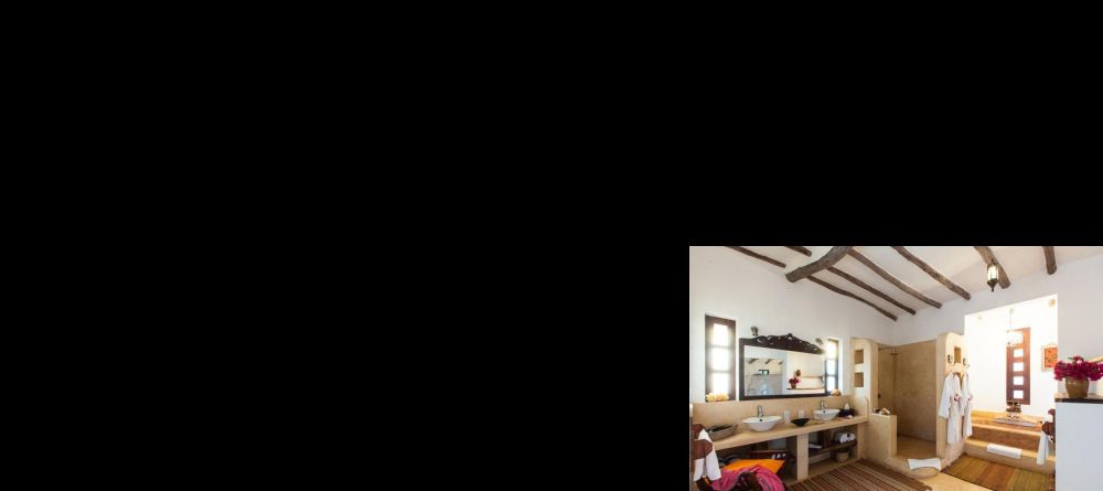 The bathrooms are modern with elements of local design at Kasha Boutique Hotel, Zanzibar, Tanzania - Image 4