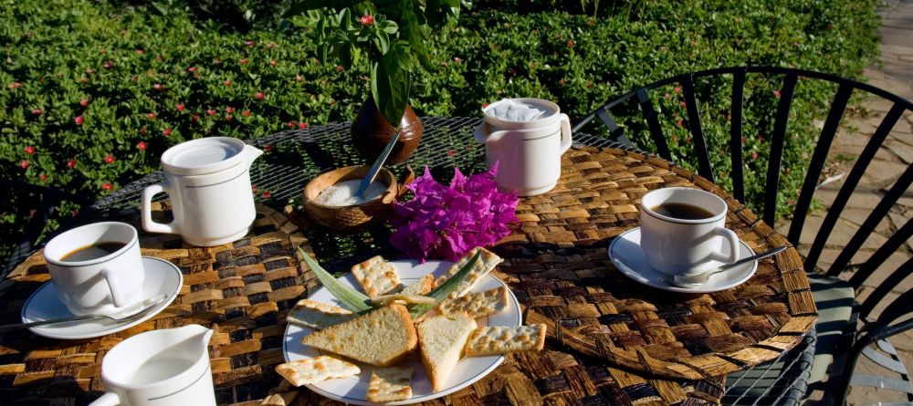 Breakfast and coffee in the sunshine at KIA Lodge, Arusha, Tanzania - Image 7
