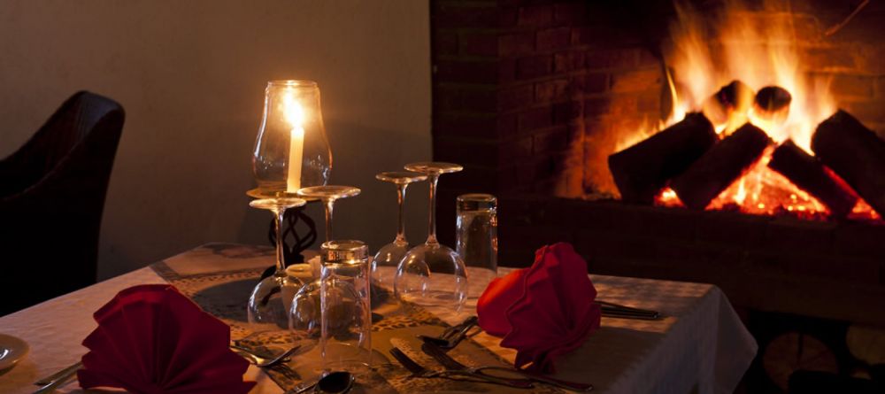 Romantic fireside dining at Kitela Lodge and African Spa, Karatu, Tanzania - Image 4