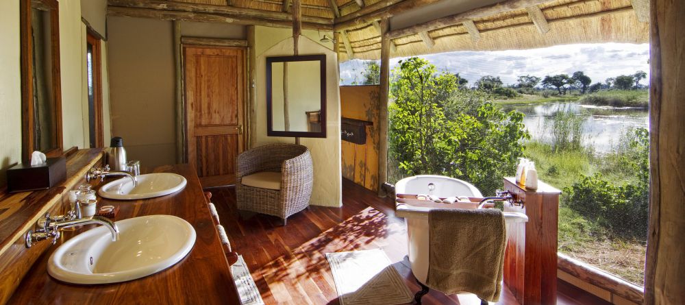 En-suite bedroom at Lagoon Camp, Linyati Wetlands, Botswana - Image 5