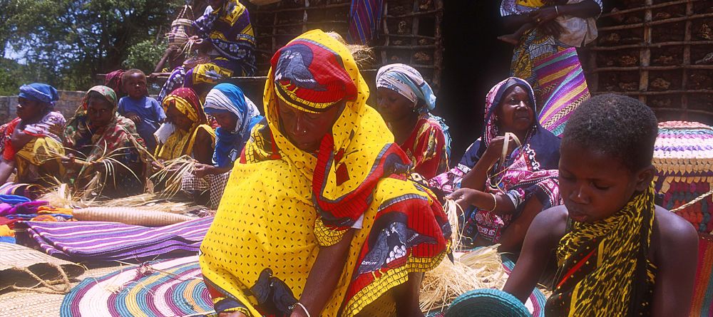 Locals doing traditional weaving at Funzi Keys, Funzi Island, Kenya - Image 10