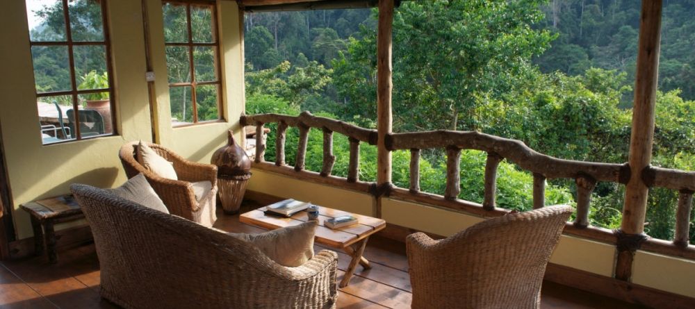 Lounge with view at Volcanoes Bwindi Lodge, Bwindi Impenetrable Forest, Uganda - Image 3