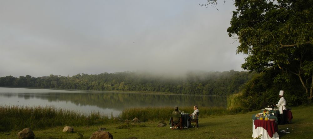 Waterside dining at Serena Mountain Village, Arusha, Tanzania - Image 3