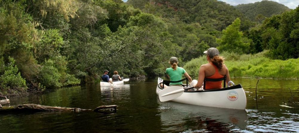 Canoeing nearby through the spectacular natural setting at Pezula Resort and Spa, Knysna, South Africa - Image 7