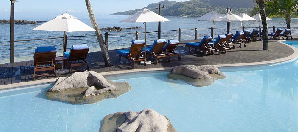 Sun loungers and and ocean view from the pool at Le Meridien Fishermans Cove, Mahe, Seychelles - Image 6