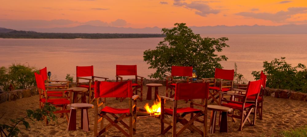 Campfires in the evening at Pumulani, Lake Malawi, Malawi - Image 5