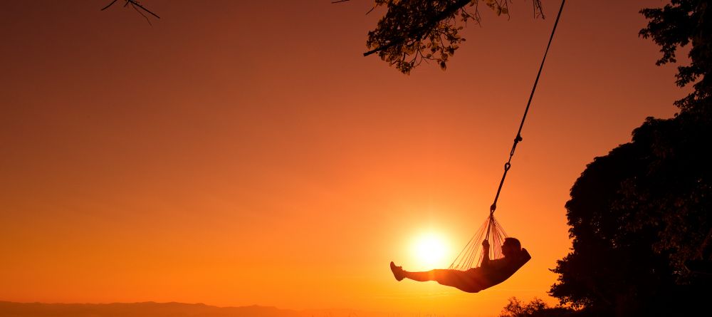 A moment of solitude and peace at sunset at Pumulani, Lake Malawi, Malawi - Image 10