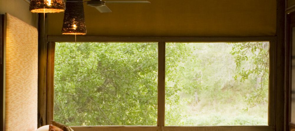 Rhino Post Safari Lodge - Bedroom - Image 6