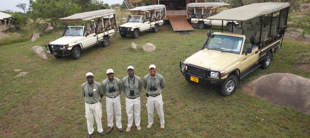 Safari guides await by their vehiclesr at Serengeti Bushtops Camp, Serengeti National Park, Tanzania - Image 12