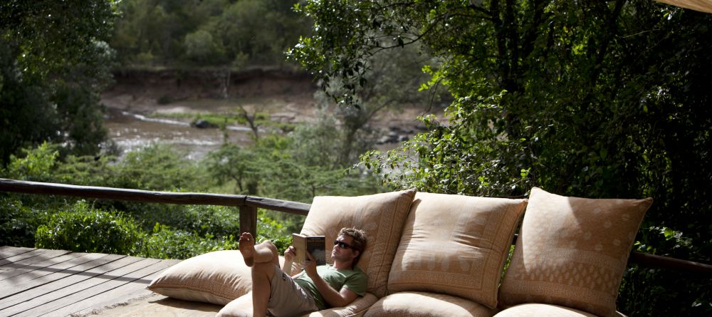 Patio reading and relaxation at Serian Camp, Masai Mara National Reserve, Kenya - Image 6