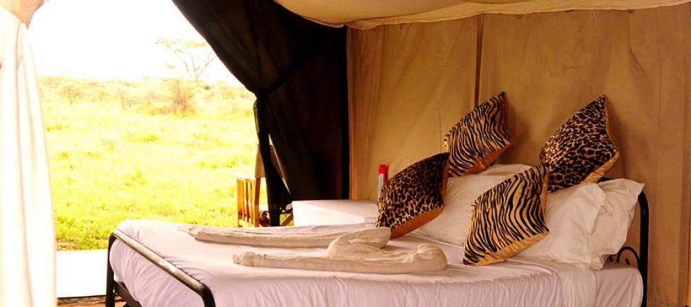 The tents offer comfort with beautiful views of the plains at Serengeti Savannah Camps, Serengeti National Park, Tanzania - Image 2