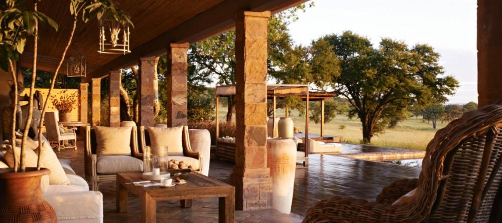 Watch the sunset over the savannah at Singita Serengeti House, Serengeti Grumeti Reserves, Tanzania - Image 14