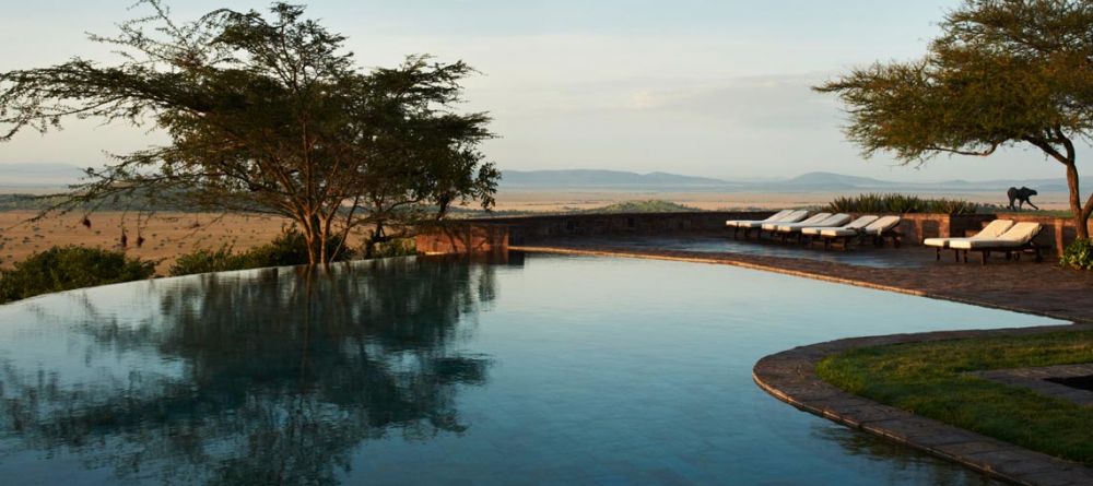 Relax by the pool and enjoy the stunning vistas at Singita Sasakwa Lodge, Grumeti Reserves, Tanzania - Image 7