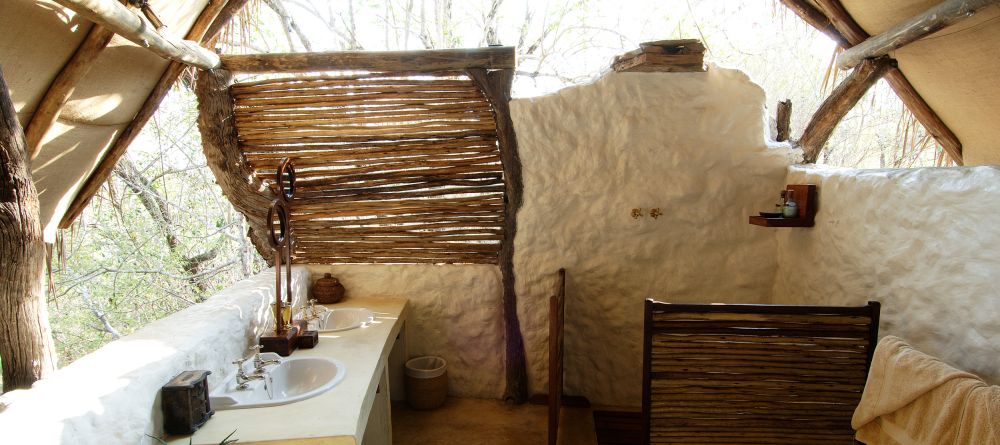 Standard bathrom- Sand Rivers Selous, Selous National Park, Tanzania Â© Nomad Tanzania - Image 9