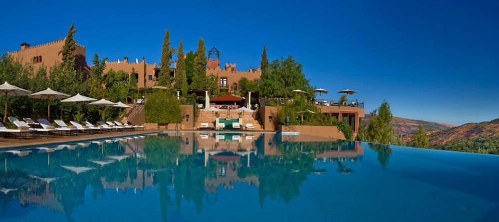 Stunning view from the main outdoor pool at Kasbah Tamadot, Atlas Mountains, Morocco - Image 4
