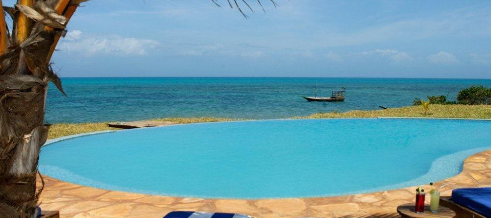 The pool with loungers at Fumba Beach Lodge, Zanzibar, Tanzania - Image 7