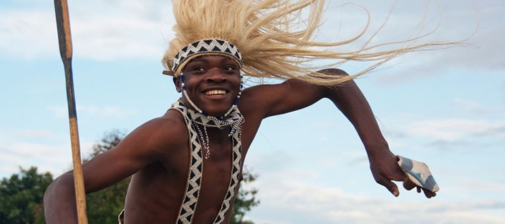 Traditional dancer at Virunga Lodge, Volcanoes National Park, Uganda - Image 9