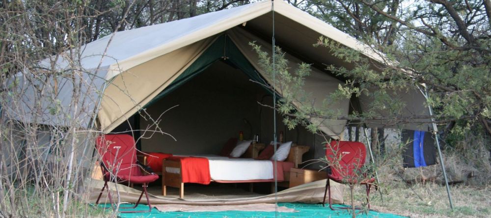 The tents are nestled into the surrounding nature at Serengeti Wilderness Camp, Serengeti NCCA, Tanzania - Image 4