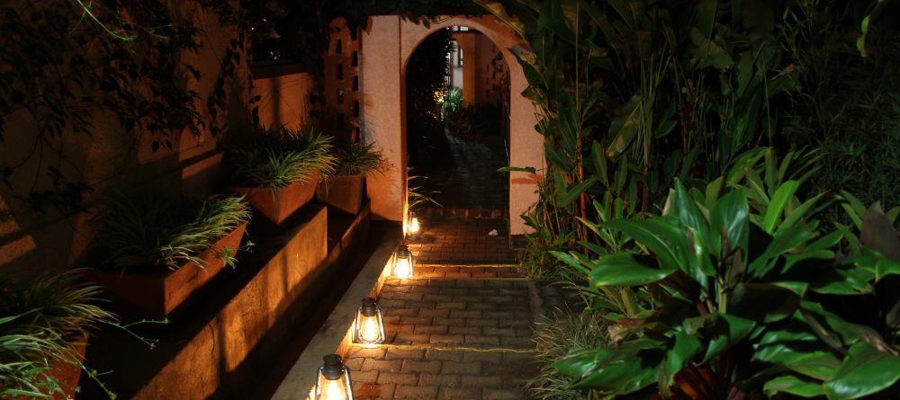 Walkway at night at Boma Lodge, Entebbe, Uganda - Image 6