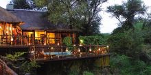 Madikwe River Lodge exterior at dusk