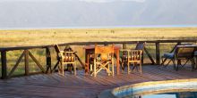 The pool deck with beautiful views at Maramboi Tented Camp, Tarangire National Park, Tanzania