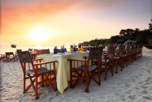 Dining on the beach at Kungwe Beach Lodge, Mahale Mountains National Park, Tanzania
