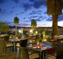 Dining on the garden terrace with a view of Windhoek at Hotel Heinitzburg, Windhoek, Namibia