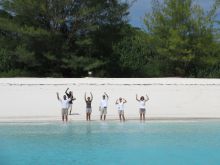 The staff waving good-bye to guests as they leave by boat at The Residence Zanzibar, Zanzibar, Tanzania (Mango staff photo)
