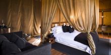 Bedroom at Xudum Okavango Delta Lodge, Okavango Delta, Botswana (AndBeyond)