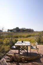 Outdoor dining by day at Xudum Okavango Delta Lodge, Okavango Delta, Botswana (AndBeyond)