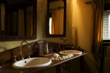 The guest bathrooms at Pole Pole Bungalow Resort, Mafia Island, Tanzania