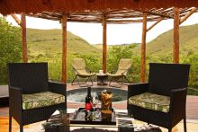 Private veranda with jacuzzi and stunning vista at Shamwari Bayethe Tented Lodge, Shamwari Game Reserve, South Africa