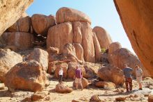 Hiking through the dramatic boulders at Wolwedans Dune Camp, NamibRand Nature Reserve, Namibia